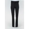 Black pants highlanding with a tag