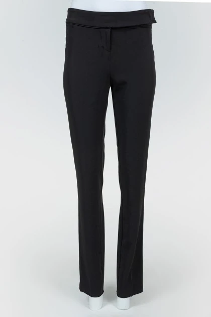 Black pants highlanding with a tag