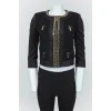 Black jacket with golden chains with a zipper