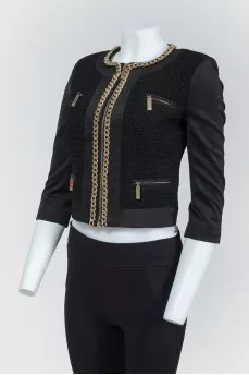 Black jacket with golden chains with a zipper