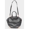 Black leather zip bag with tag
