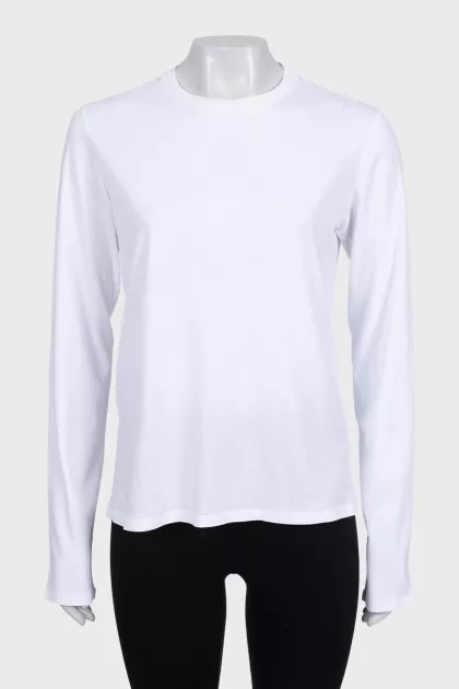 White straight-cut jumper with a tag