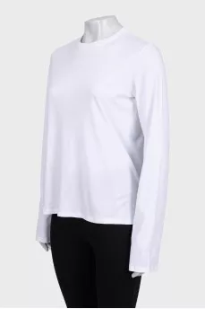 White straight-cut jumper with a tag