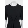 Black fitted dress with a cutout back