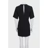 Black fitted dress with a cutout back