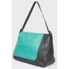Leather bag with multi -colored abstract print