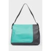 Leather bag with multi -colored abstract print