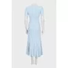 Fitted dress with buttons and tag