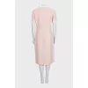 Fitted dress decorated with gold buttons