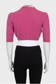 Cropped pink cardigan with decoration