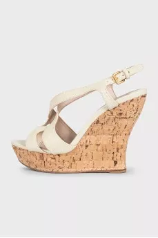 Beige leather wedge sandals