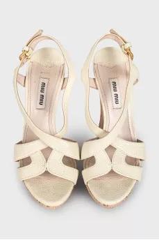 Beige leather wedge sandals