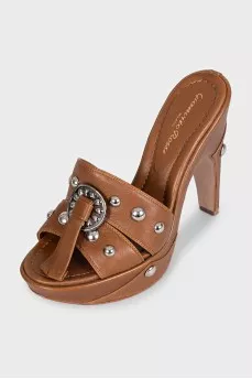 Brown leather sandals with metallic embellishments