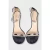 Black sandals decorated with bows