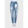 Blue ripped jeans with tag