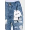 Blue ripped jeans with tag