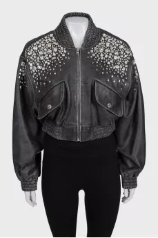 Leather jacket decorated with crystals