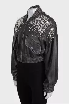 Leather jacket decorated with crystals