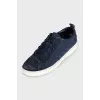 Blue sneakers with a 3D branded print