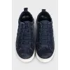 Blue sneakers with a 3D branded print