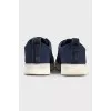 Blue sneakers with a 3D branded print
