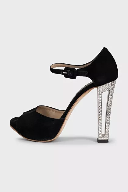 Black sandals with decorated heels