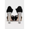 Black sandals with decorated heels