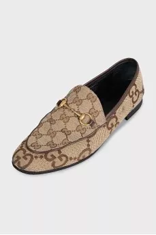 Brown loafers with a signature print