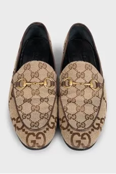 Brown loafers with a signature print