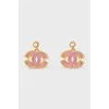 Decorated gold-plated earrings in the shape of a logo
