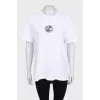 White straight-cut T-shirt with a brand logo