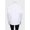 White straight-cut T-shirt with a brand logo