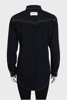 Black denim shirt decorated with fringe