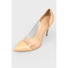 Beige leather pumps with sheer insert