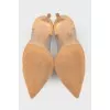Beige leather pumps with sheer insert