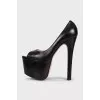Leather shoes with a high platform and heels