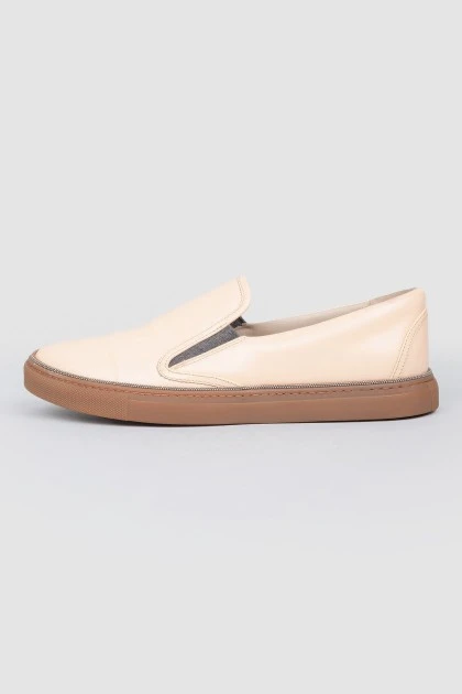 Leather moccasins with brown soles