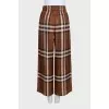 Brown silk pants with signature print