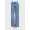 Blue jeans decorated with rhinestones