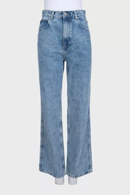 Blue jeans decorated with rhinestones