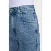 Blue jeans decorated with rhinestones