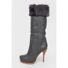 Black leather stiletto heeled boots