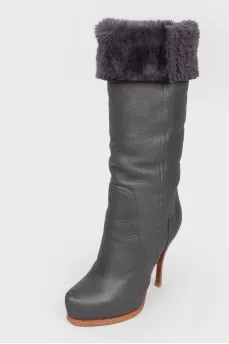 Black leather stiletto heeled boots