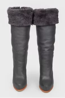 Black leather stiletto heeled boots
