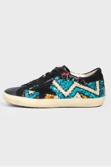 Leather sneakers with rhinestones on lacing