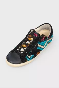 Leather sneakers with rhinestones on lacing