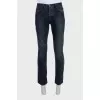 Men's blue cropped jeans with buttons