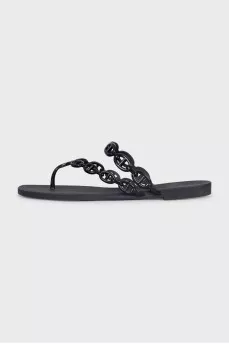 Black rubber flip flops