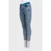 Blue jeans with a signature print