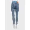 Blue jeans with a signature print
